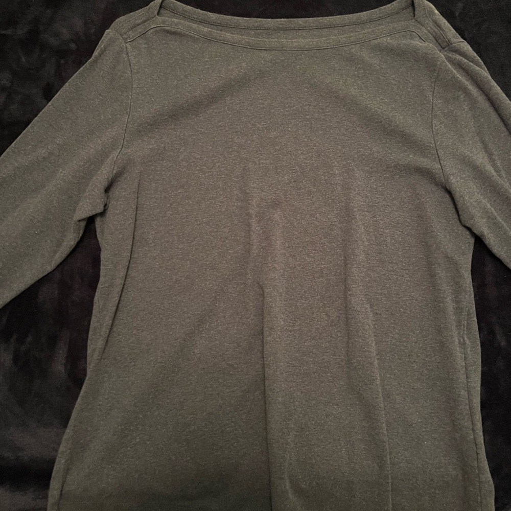 Dark grey long sleeve shirt.